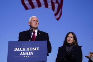 Former Vice President Mike Pence speaks after arriving back in his hometown of Columbus, Ind., as his wife Karen watches. Less than three months after former President Donald Trump left the White House, the race to succeed him is already beginning. Pence has started a political advocacy group, finalized a book deal and later this month in South Carolina will give his first speech since leaving office
Trump Republicans, Columbus, United States - 20 Jan 2021