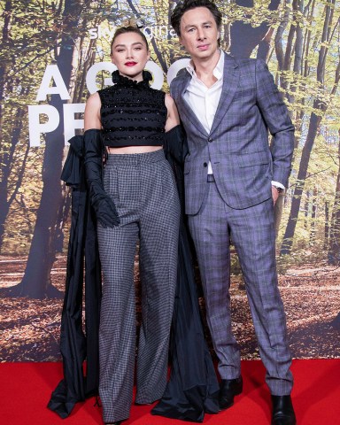 Zach Braff, right, and Florence Pugh pose for photographers upon arrival for the premiere of the film 'A Good Person' in London
A Good Person Premiere, London, United Kingdom - 08 Mar 2023