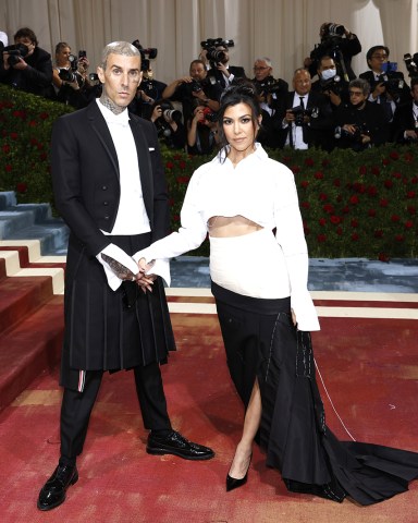 Travis Barker and Kourtney Kardashian arrive on the red carpet for The Met Gala at The Metropolitan Museum of Art celebrating the Costume Institute opening of "In America: An Anthology of Fashion" in New York City on Monday, May 2, 2022.
2022 Met Gala, New York, United States - 03 May 2022