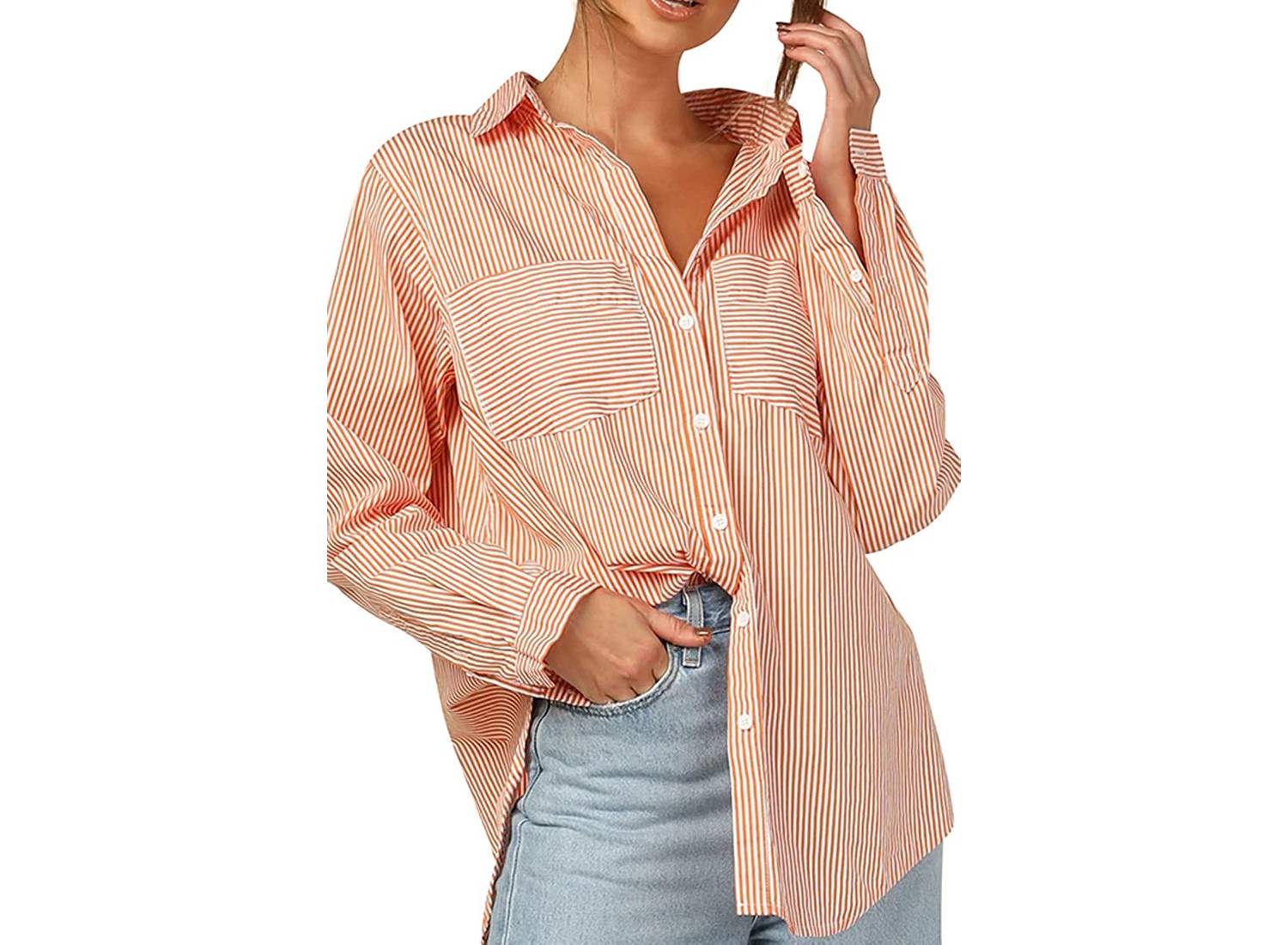 Woman wearing orange and white striped button-down top with denim pants