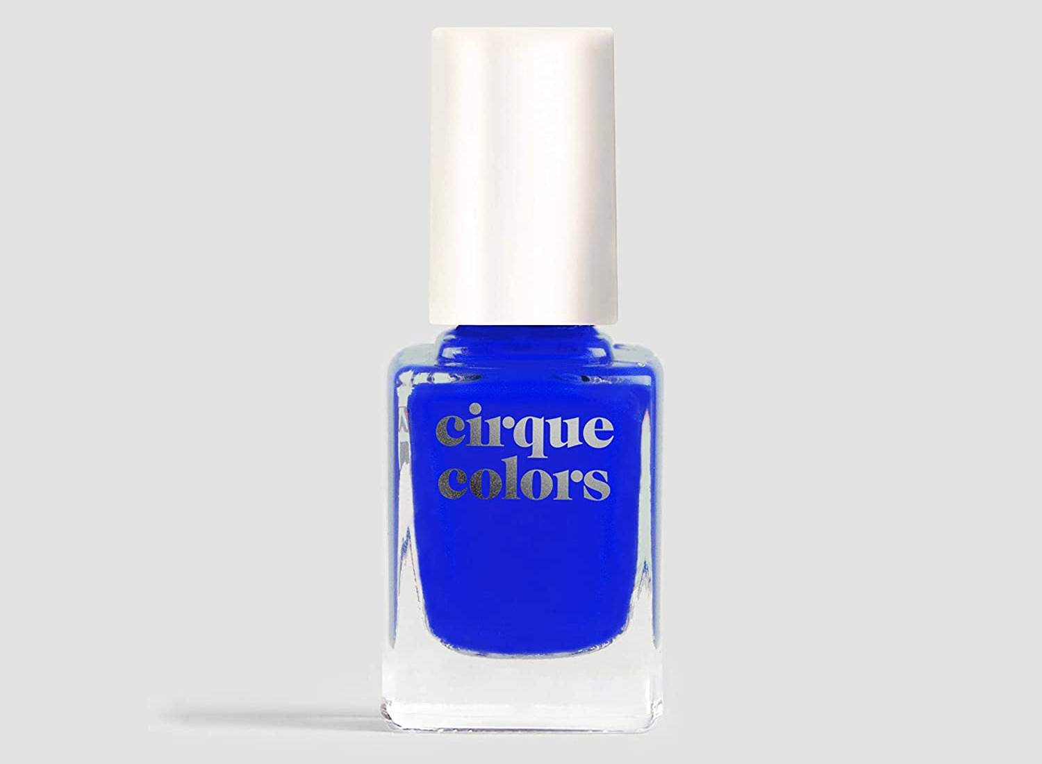 A bottle of Cirque colors dark blue creme nail polish in the shade "NYFW"