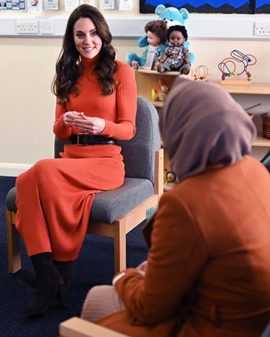 Catherine Princess of Wales (2L) talks with parents during her visit to Foxcubs Nursery in Luton, north of London on January 18, 2023, as part of her ongoing work to elevate the importance of early childhood to lifelong outcomes.
Catherine Princess of Wales visit to Foxcubs Nursery, Luton, UK - 18 Jan 2023