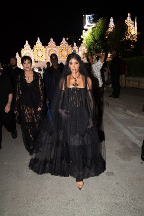 Puglia, ITALY - Kim stages Kardashian's The First Night of the Dolce & Gabbana's Alta Moda festivities in Puglia, Italy. Kim wore a dramatic fitted black dress with a dramatic necklace and veil as she was escorted by Domenico Dolce. Mum Kris Jenner was also in attendance. Pictured: Kim Kardahian, Domenico Dolce BACKGRID USA JULY 9, 2023 BYLINE MUST READ: Tomas Herold / BACKGRID USA: +1 310 798 9 ​​111 / usasales@backgrid.com UK: +44 208 344 2007 / uksales@backgrid.com *UK Customers - Images containing children, please rasterize face before posting*