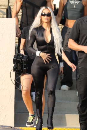 Los Angeles, CA - *EXCLUSIVE* - Kim Kardashian donned her favorite sexy outfit ahead of a photo shoot in LA The reality TV star was seen sporting a slim body-hugging black jumpsuit her and a pair of high heels for the photo shoot.  Pictured: Kim Kardashian BACKGRID US September 14, 2022 US: +1 310 798 9111 / usasales@backgrid.com UK: +44 208 344 2007 / uksales@backgrid.com * UK Customers - Images with Children Please focus on faces before publishing *
