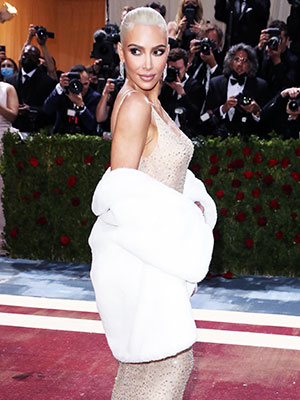 Kim Kardashian Rocks Tight White SKIMS Column Dress In New Photos –  Hollywood Life