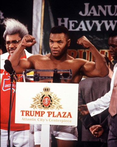 Mike Tyson at the Pre Larry Holmes Weigh In Boxing Promoter Don King in the background Las Vegas 22/1/88 United States Las Vegas Tyson v Holmes
Sport