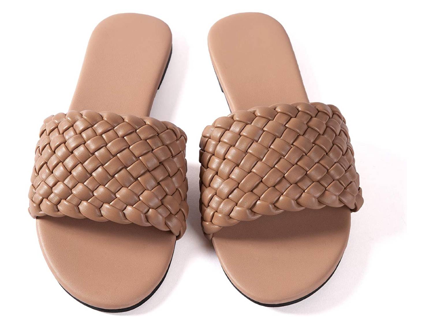 A pair of tan braided slide sandals
