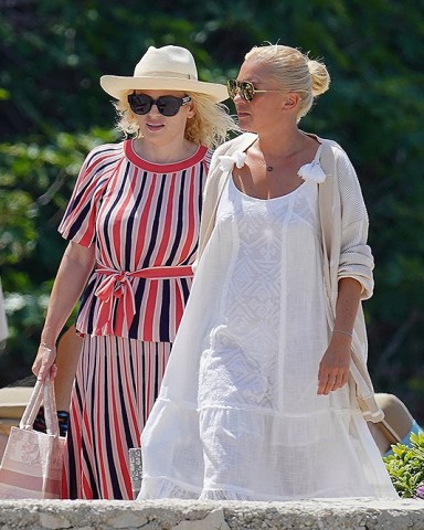 Cannes, FRANCE  - *EXCLUSIVE*  - Australian actress Rebel Wilson and her girlfriend Ramona Agruma make their public debut as a couple arriving at La Guérite restaurant in Cannes for Sterling Jones' birthday.  **SHOT ON 06/17/2022**  Pictured: Rebel Wilson, Ramona Agruma  BACKGRID USA 18 JUNE 2022   USA: +1 310 798 9111 / usasales@backgrid.com  UK: +44 208 344 2007 / uksales@backgrid.com  *UK Clients - Pictures Containing Children Please Pixelate Face Prior To Publication*