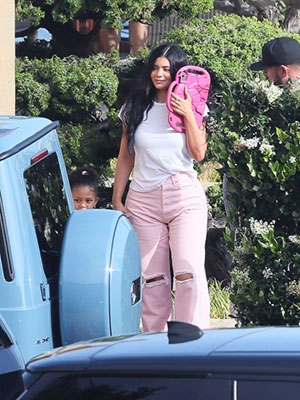 Kylie Jenner: New Mom's Wax Figure Steps Out with Stroller