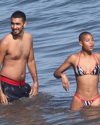 *EXCLUSIVE* Malibu, CA  - Actress and singer Willow Smith and her new male companion share a funny cigarette before cooling off in the ocean together and exchanging phone numbers before going their separate ways.Pictured: Willow SmithBACKGRID USA 24 JUNE 2022 BYLINE MUST READ: RMBI / BACKGRIDUSA: +1 310 798 9111 / usasales@backgrid.comUK: +44 208 344 2007 / uksales@backgrid.com*UK Clients - Pictures Containing ChildrenPlease Pixelate Face Prior To Publication*