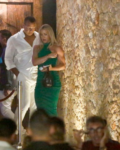 EXCLUSIVE: Alex Rodriguez and his girlfriend Kathryne Padgett are seen leaving the "Lío" cabaret, restaurant and nightclub in Ibiza after a night out in the early hours of June 21, 2022 in Ibiza, Spain. Kathryne Padgett who wears a green dress is seen with an energy drink in her hands. 21 Jun 2022 Pictured: Alex Rodriguez and Kathryne Padgett. Photo credit: Elkin Cabarcas / MEGA TheMegaAgency.com +1 888 505 6342 (Mega Agency TagID: MEGA870428_002.jpg) [Photo via Mega Agency]