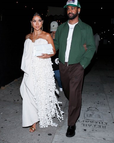 West Hollywood, CA  - *EXCLUSIVE*  - Father-to-be and rapper, Big Sean is the perfect gentleman as he is seen escorting his very pregnant girlfriend Jhene Aiko out of The Nice Guy. Jhene is radiating the pregnancy glow as she makes a fashionable exit donning a white maxi dress and gold heels.  Pictured: Big Sean, Jhene Aiko  BACKGRID USA 24 JULY 2022   BYLINE MUST READ: NGRE / BACKGRID  USA: +1 310 798 9111 / usasales@backgrid.com  UK: +44 208 344 2007 / uksales@backgrid.com  *UK Clients - Pictures Containing Children Please Pixelate Face Prior To Publication*