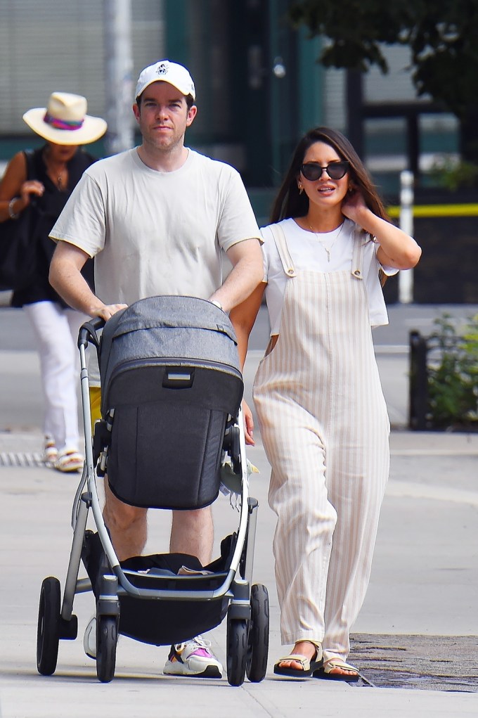 Olivia Munn & John Mulaney on a walk with their son
