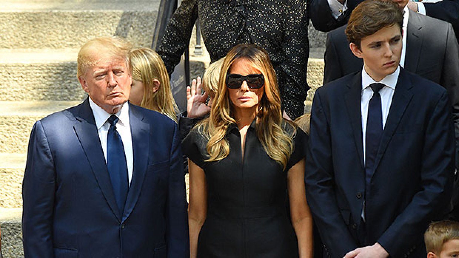 Barron Trump Towers Over Donald & Melania At Ivana’s Funeral: Photo ...