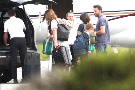 Ben Affleck and his children are seen at a private airport in Georgia after his wedding to Jennifer Lopez. 21 Aug 2022 Pictured: Ben Affleck and daughters Violet, Seraphina, and son Samuel. Photo credit: Dana Mixer / MEGA TheMegaAgency.com +1 888 505 6342 (Mega Agency TagID: MEGA888243_010.jpg) [Photo via Mega Agency]