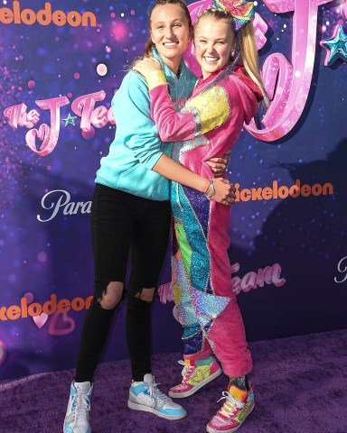 Kylie Prew, left, and JoJo Siwa arrive at the drive-in premiere of JoJo Siwa's "The J Team", at the Rose Bowl in Pasadena, Calif
JoJo Siwa's "The J Team" Drive-In Premiere, Pasadena, United States - 03 Sep 2021