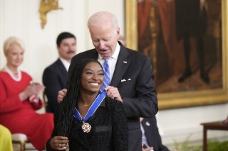 Gymnast Simone Biles accepts the Medal of Freedom from United States President Joe Biden during a ceremony in the East Room of the White House in Washington, DC.
Biden Presents the Medal of Freedom to Seventeen Recipients, Washington, District of Columbia, USA - 07 Jul 2022