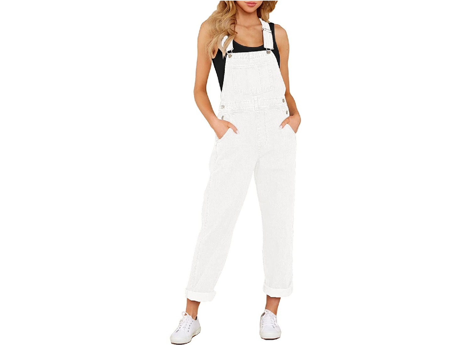 A model wearing a pair of white overalls.