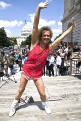 Richard Simmons leads a group of Capitol Hill staffers and tourists in an exercise routine.Exercise Guru, Richard Simmons promoting programmes to fight obesity, Washington DC, America - 24 Jul 2008American fitness guru Richard Simmons brought his own brand of fitness to Washington after testifying before the House Education Committee on childhood obesity. The 60-year-old would like to see the government doing more to tackle the issue of childhood obesity and is also pushing for increased school exercise programs. "Our children today will not live as long as their parents. What have we done? What have we done to the kids of the United States of America! This is wrong! And I will dedicate the rest of my life!" he said; adding that not everyone can be an athlete but everyone can be fit, he said schools need to hire certified fitness instructors. While giving his testimony Simmons, who hinted that he may even run for office, was dressed in a smart black suit. However, he then quickly changed into a more familiar outfit of tiny striped shorts and red top to give an impromptu fitness session outside.