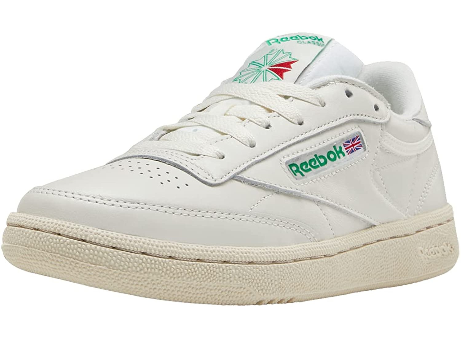 A pair of white Reebok sneakers.