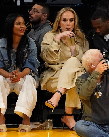 Adele along with boyfriend Rich Paul and actress Nia Long are seen at Game 3 of the NBA Playoffs between the Los Angeles Lakers and The Golden State Warriors at Crypto.com Arena in Los Angeles, CaPictured: Nia Long,Adele,Rich PaulRef: SPL6426695 060523 NON-EXCLUSIVEPicture by: London Entertainment / SplashNews.comSplash News and PicturesUSA: +1 310-525-5808London: +44 (0)20 8126 1009Berlin: +49 175 3764 166photodesk@splashnews.comWorld Rights