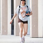 *EXCLUSIVE* Billie Eilish shows off toned-up legs as she works out in a quirky boob print top!