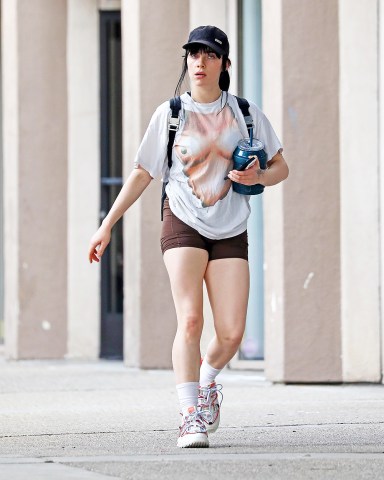Los Angeles, CA  - *EXCLUSIVE*  - Singer Billie Eilish is out in Los Angeles with a big smile on her face as we catch her leaving the gym one week after her parent's home is doxxed by a crime app. Billie wears a quirky boob print top and brown workout shorts as she walks back to her car with a friend.Pictured: Billie EilishBACKGRID USA 13 JANUARY 2023 USA: +1 310 798 9111 / usasales@backgrid.comUK: +44 208 344 2007 / uksales@backgrid.com*UK Clients - Pictures Containing ChildrenPlease Pixelate Face Prior To Publication*
