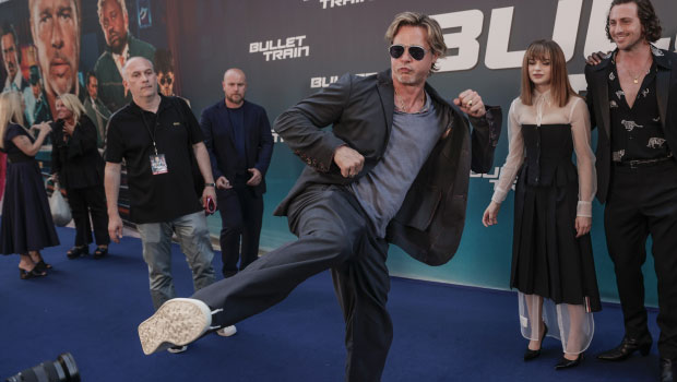 Brad Pitt Performs Epic Karate Kick on Red Carpet at Paris Premiere of 'Bullet Train': Photos