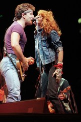 Bruce Springsteen and the E. Street Band perfom at Giants Stadium, East Rutherford, NJ, . Bruce shares the microphone with vocalist Patti Scialfa. The band was touring in support of their "Born in the USA" album
Born in the USA Tour 1985, East Rutherford, USA
