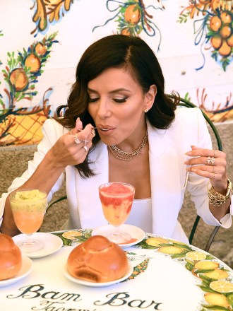 Eva Longoria eats a granita at the Bam Bar in the company of Andrea Iervolino in Taormina, Italy.Pictured: Eva LongoriaRef: SPL5322761 290622 NON-EXCLUSIVEPicture by: Maurizio D'Avanzo/IPA / SplashNews.comSplash News and PicturesUSA: +1 310-525-5808London: +44 (0)20 8126 1009Berlin: +49 175 3764 166photodesk@splashnews.comWorld Rights, No France Rights, No Italy Rights, No Portugal Rights, No Spain Rights