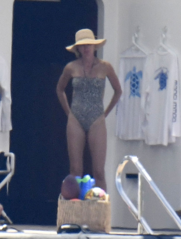 Gisele Bundchen showcases her supermodel frame in patterned swimsuit during  beach photoshoot