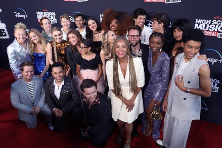 The cast and producers on the red carpet before the premiere of Season 3 of the DISNEY+ series HIGH SCHOOL MUSICAL: THE MUSICAL: THE SERIES at Walt Disney Studios in Burbank, CA, USA on July 27, 2022 Posing. DISNEY+ SERIES: 