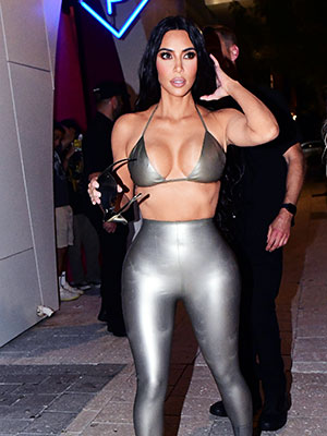 Kim Kardashian Is a Metallic Diva in a Matching Silver Bikini Top and  Leggings