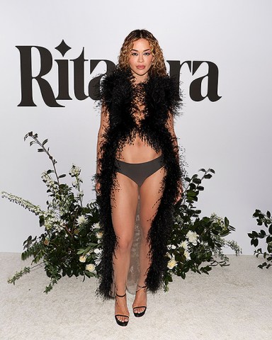 Rita Ora Redefined Minimalism in a Sheer Black Dress and Matching Underwear—See  Pics