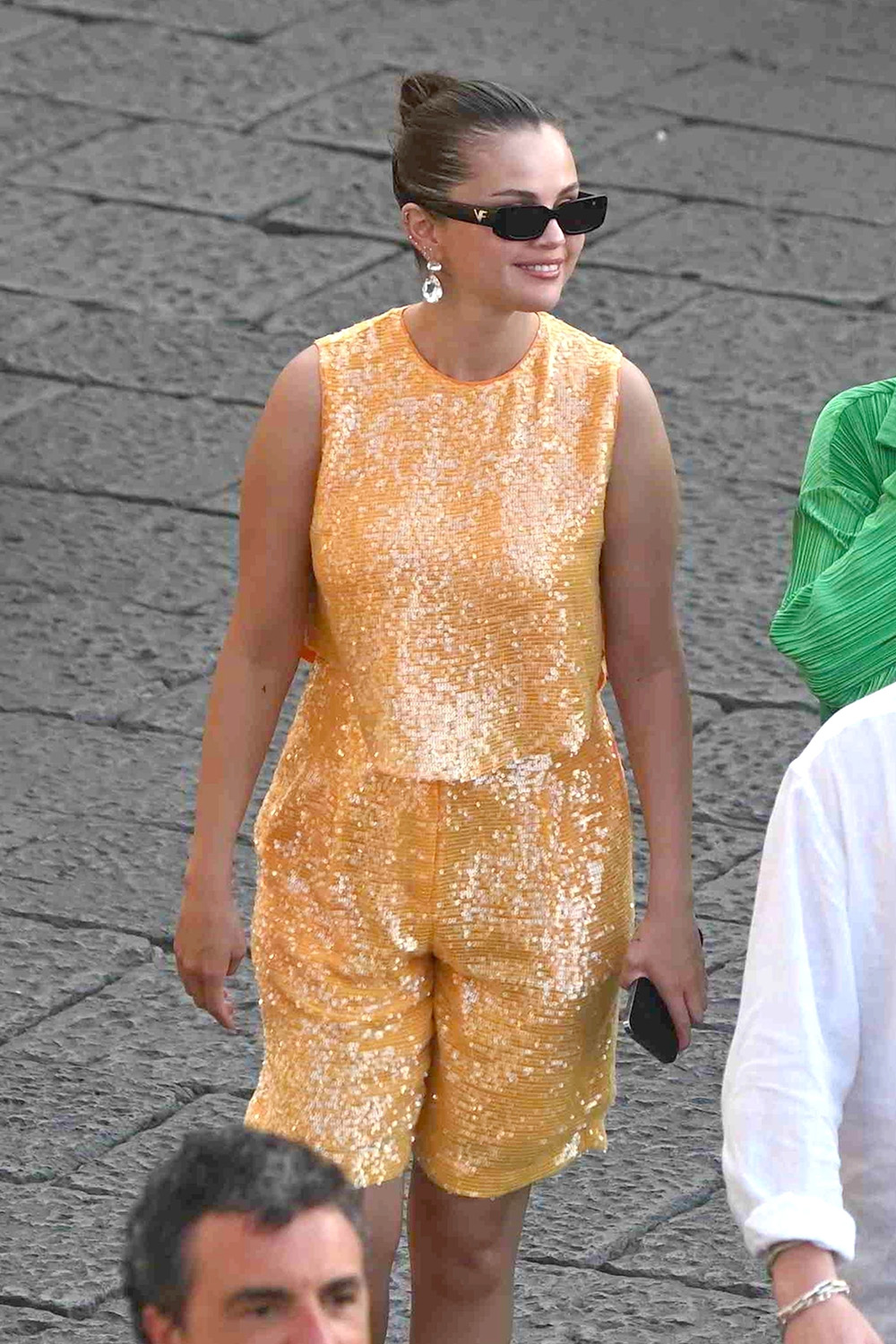 Capri, ITALY - *EXCLUSIVE* - American singer Selena Gomez walks around town browsing the shops while on vacation in Capri, Italy. Selena with her A sequin dress was seen with friends entering the Prada designer boutique, as a rather stylish-looking Italian-Canadian film producer Andrea Iervolino in her suit jacket joined Selena on the shopping spree. USA AUGUST 5, 2022 BYLINE MUST READ: Cobra Team / BACKGRID USA: +1 310 798 9111 / usasales@backgrid.com UK: +44 208 344 2007 / uksales@backgrid.com *UK Customers - Images containing children Please pixelate face before Publish*