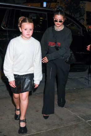West Hollywood, CA - *EXCLUSIVE* - Nicola Peltz was spotted arriving together with her husband Brooklyn, BFF Selena Gomez, and Selena's young half-sister Gracie at her birthday dinner at Cecconi's Restaurant in Los Angeles. Pictured: Selena Gomez, Gracie Teefey BACKGRID USA 8 JANUARY 2023 BYLINE MUST READ: affinitypicture / BACKGRID USA: +1 310 798 9111 / usasales@backgrid.com UK: +44 208 344 2007 / uksales@backgrid.com *UK Clients - Pictures Containing Children Please Pixelate Face Prior To Publication*