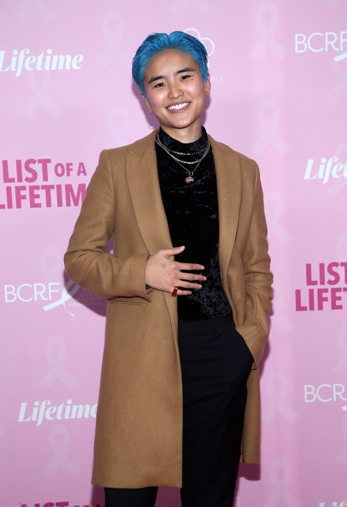 Terry Hu shows off blue hair at the ‘List of a Lifetime’ film premiere