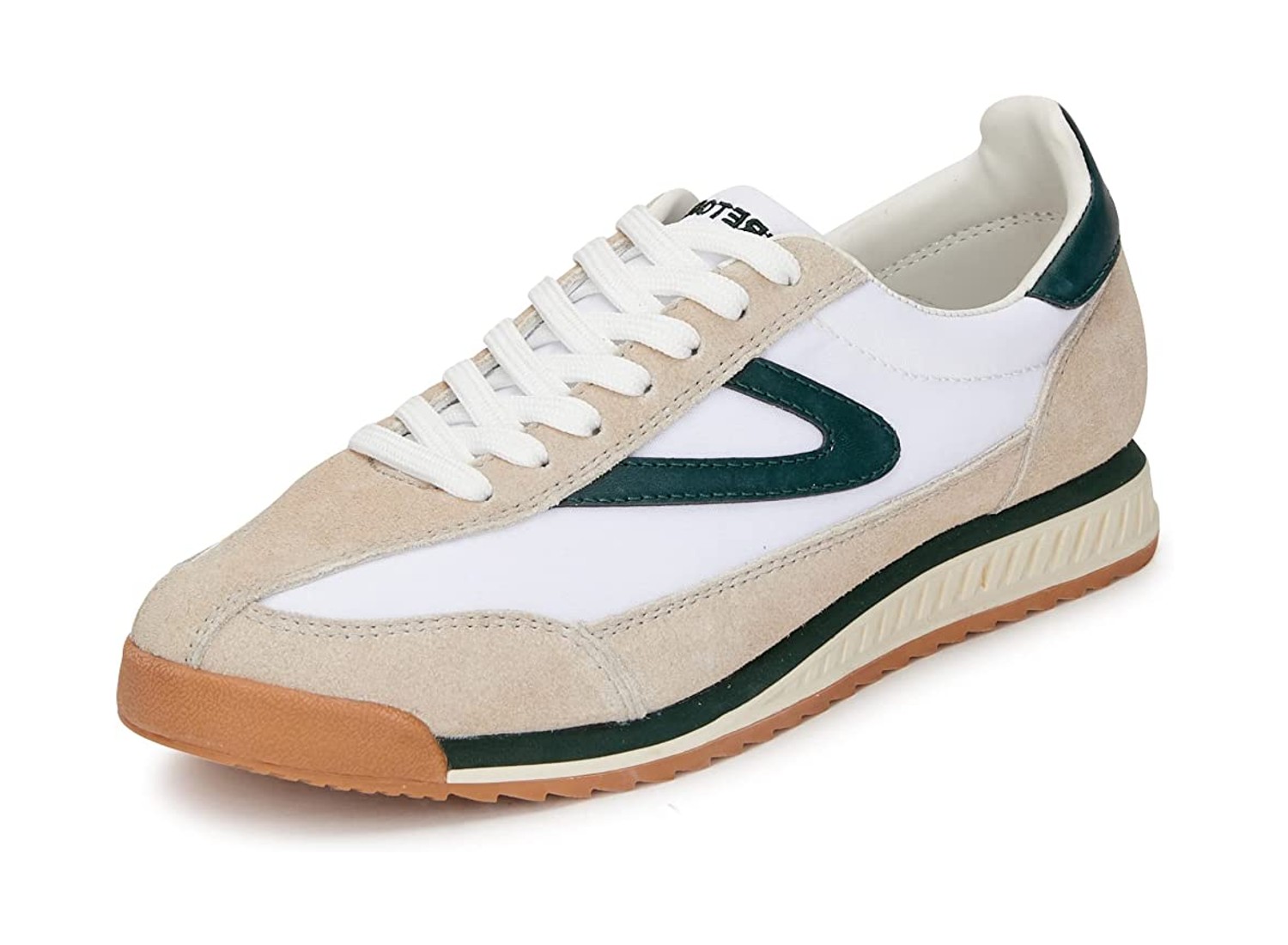 A white/green Tretorn sneaker.