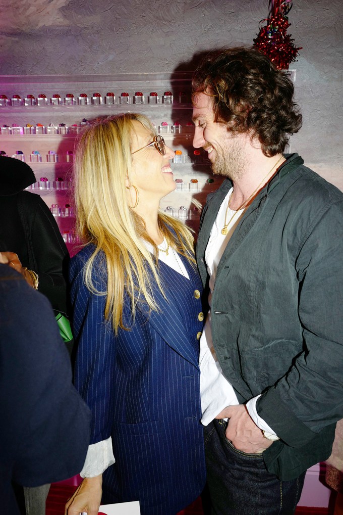Aaron and Sam Taylor-Johnson at a boutique in London
