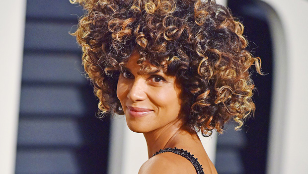 Halle Berry Shows Off Her Natural Curly Hair While Drinking From A Coconut On Vacation