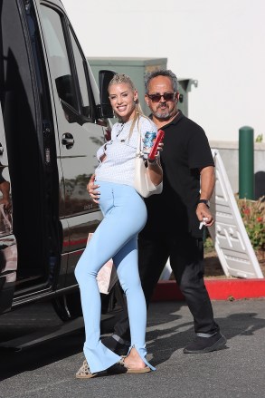 WEST HOLLYWOOD, Calif. - Pregnant Heather Ray El Moussa shows off her growing baby bump during the filming of Selling Sunset in West Hollywood. PHOTO: Heather Rae El Moussa BACKGRID USA 26 August 2022 BYLINE MUST READ: BACKGRID USA: +1 310 798 9111 / usasales@backgrid.com UK: +44 208 344 2007 / uksales@backgrid.com SEE FACE BEFORE PUBLICATION Pixelate*