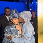 *EXCLUSIVE* A$AP Rocky gives Rihanna a big kiss outside the Louis Vuitton Show