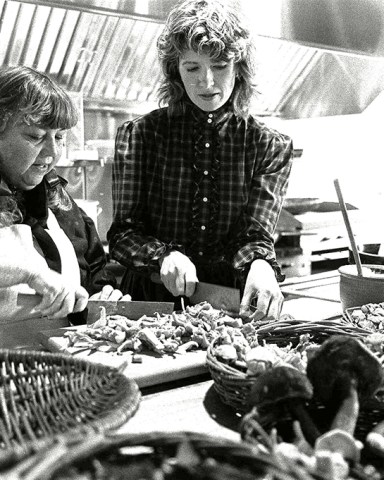 MARTHA STEWART Martha Stewart, right, cook and author of a new book, "Entertaining," and her friend and restaurant consultant Ruth Leserman of San Francisco, chop mushrooms while preparing dishes for a luncheon. The affair in Westport, Conn., in 1982 was to celebrate the book's publicationMARTHA STEWART, WESTPORT, USA