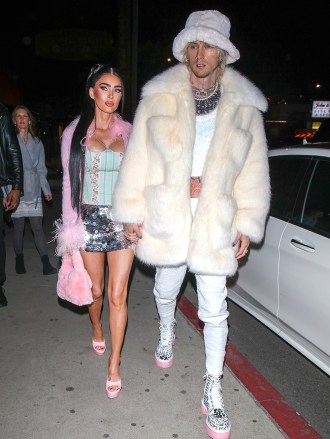 Los Angeles, CA - Megan Fox and MGK arrive in matching pink and white outfits at Catch Steak LA in Los Angeles.Pictured: Megan Fox, MGK, Machine Gun KellyBACKGRID USA 19 DECEMBER 2022 BYLINE MUST READ: HEDO / BACKGRIDUSA: +1 310 798 9111 / usasales@backgrid.comUK: +44 208 344 2007 / uksales@backgrid.com*UK Clients - Pictures Containing ChildrenPlease Pixelate Face Prior To Publication*