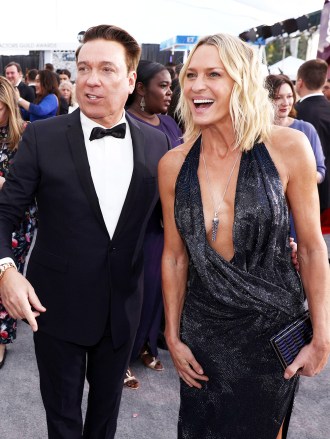 Matt Bomer, Clement Giraudet, Robin Wright. Matt Bomer, from left, Clement Giraudet, and Robin Wright arrive at the 25th annual Screen Actors Guild Awards at the Shrine Auditorium & Expo Hall, in Los Angeles
25th Annual SAG Awards - Red Carpet, Los Angeles, USA - 27 Jan 2019