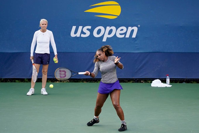 Serena Williams hits a ball