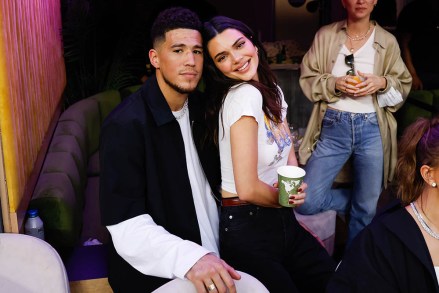 nba player devin booker of the phoenix suns (l) poses with kendall jenner during half time of super bowl lvi between the los angeles rams and the cincinnati bengals at sofi stadium in los angeles on sunday, february 13, 2022.
super bowl lvi, los angeles