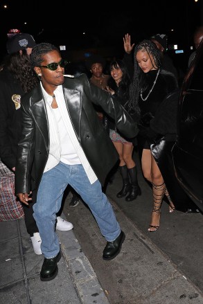 West Hollywood, CA - *EXCLUSIVE* - Rihanna and ASAP Rocky hold hands as they are spotted going to The Fleur Room lounge to party for ASAP's whiskey brand Mercer & Prince in West Hollywood.  The party was hosted by ASAP Rocky and Whalecard.  Rapper ASAP is wearing blue jeans, black dress shoes, a white buttoned up dress shirt and a black leather jacket while smoking a cigarette.  Singer Rihanna is dressed in all black as she shows off her braided hair for the event.  Pictured: Rihanna, ASAP Rocky BACKGRID USA 12 NOVEMBER 2022 USA: +1 310 798 9111 / usasales@backgrid.com UK: +44 208 344 2007 / uksales@backgrid.com *UK Clients - Pictures Containing Children Please Pixelate Face Prior To Publication *