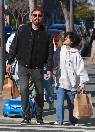 Santa Monica, CA - *EXCLUSIVE* - Ben Affleck and Jennifer Lopez’s daughter Emme were spotted having a blast together in Santa Monica! The pair went to a used store book store first before heading to a thrift store where they shopped for more fun items. Later they hit up a drive thru at Ben’s favorite fast food place, Jack in the Box! Pictured: Ben Affleck BACKGRID USA 2 APRIL 2023 BYLINE MUST READ: LaStarPixMEDIA / BACKGRID USA: +1 310 798 9111 / usasales@backgrid.com UK: +44 208 344 2007 / uksales@backgrid.com *UK Clients - Pictures Containing Children Please Pixelate Face Prior To Publication*