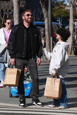 Santa Monica, CA - *EXCLUSIVE* - Ben Affleck and Jennifer Lopez's daughter Emme was spotted having fun together in Santa Monica!  The couple first went to a used bookstore before heading to a thrift store where they shopped for more interesting items.  Then they drove past Ben's favorite fast food, Jack in the Box!  Photo: Ben Affleck BACKGRID USA April 2, 2023 TRACKING MUST READ: LaStarPixMEDIA / BACKGRID USA: +1 310 798 9111 / usasales@backgrid.com United Kingdom: +44 208 344 2007 / uksales@backgrid.com *UK customers - Please have images containing children Face Pixels before publishing*